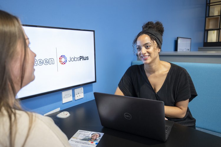 Khialah Wilson, employability caseworker, at the Jobs Plus co-social location base in the Stockton Touchpoint store